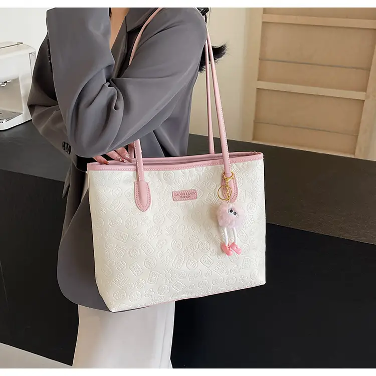 Women's White Embossed Shoulder Bag with Pink Handle & Doll Key — feature 10