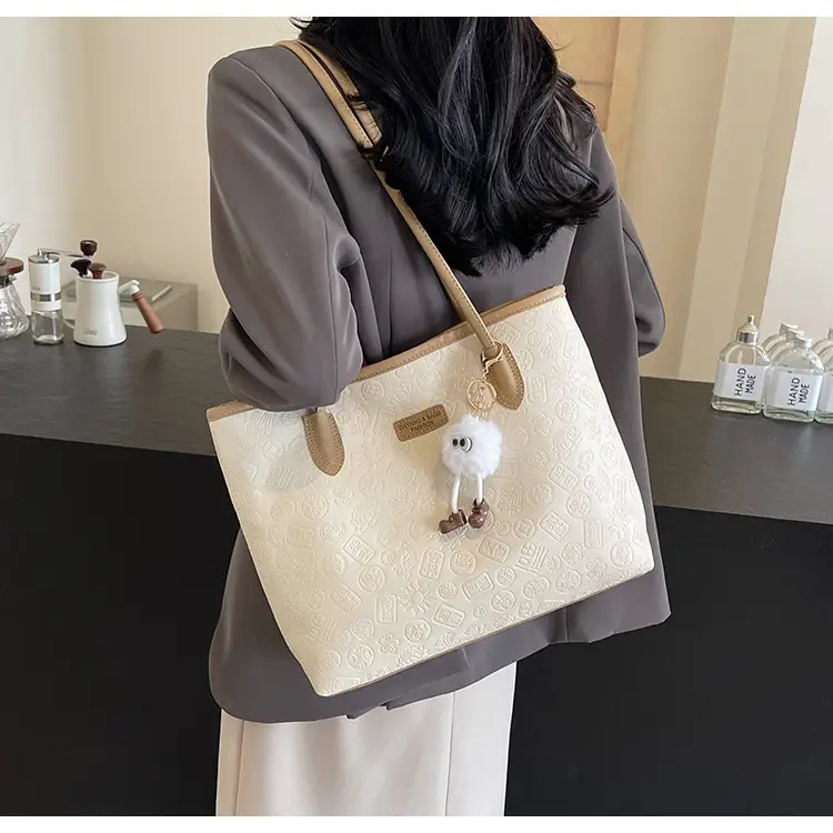 Women's White Embossed Shoulder Bag with Pink Handle & Doll Key — feature 11