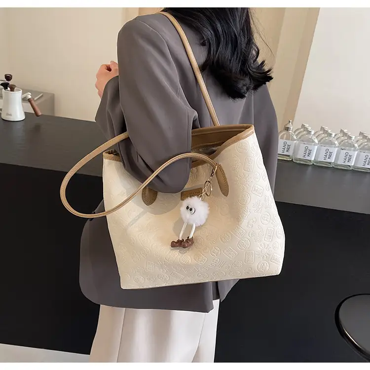 Women's White Embossed Shoulder Bag with Pink Handle & Doll Key — feature 12