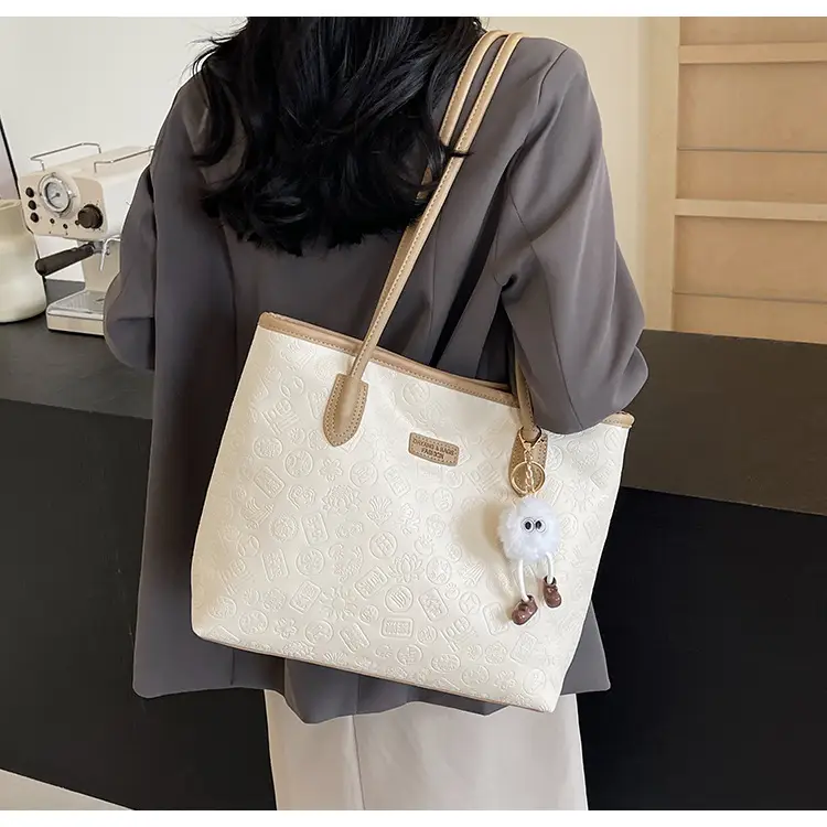 Women's White Embossed Shoulder Bag with Pink Handle & Doll Key — feature 13