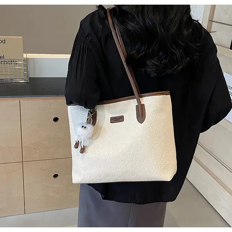 Women's White Embossed Shoulder Bag with Pink Handle & Doll Key — feature 17