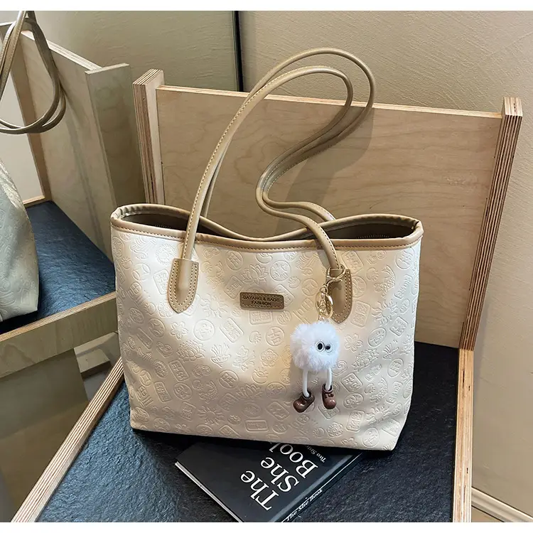 Women's White Embossed Shoulder Bag with Pink Handle & Doll Key — feature 23