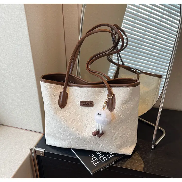 Women's White Embossed Shoulder Bag with Pink Handle & Doll Key — feature 26