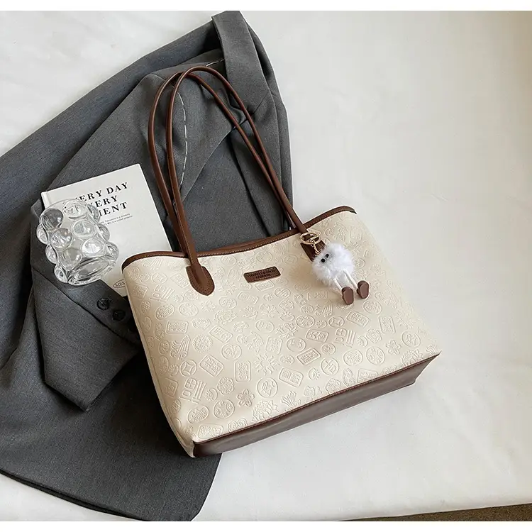Women's White Embossed Shoulder Bag with Pink Handle & Doll Key — feature 28