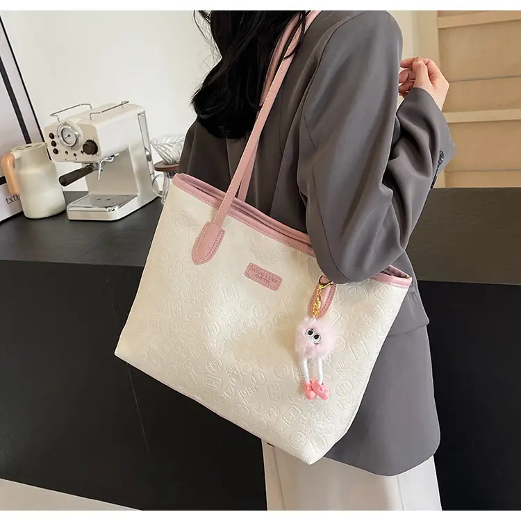 Women's White Embossed Shoulder Bag with Pink Handle & Doll Key — feature 9
