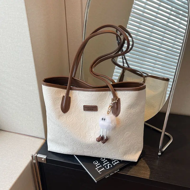 Women's White Embossed Shoulder Bag with Pink Handle & Doll Key