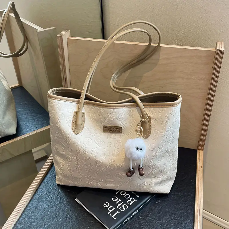 Women's White Embossed Shoulder Bag with Pink Handle & Doll Key