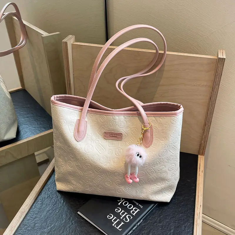 Women's White Embossed Shoulder Bag with Pink Handle & Doll Key