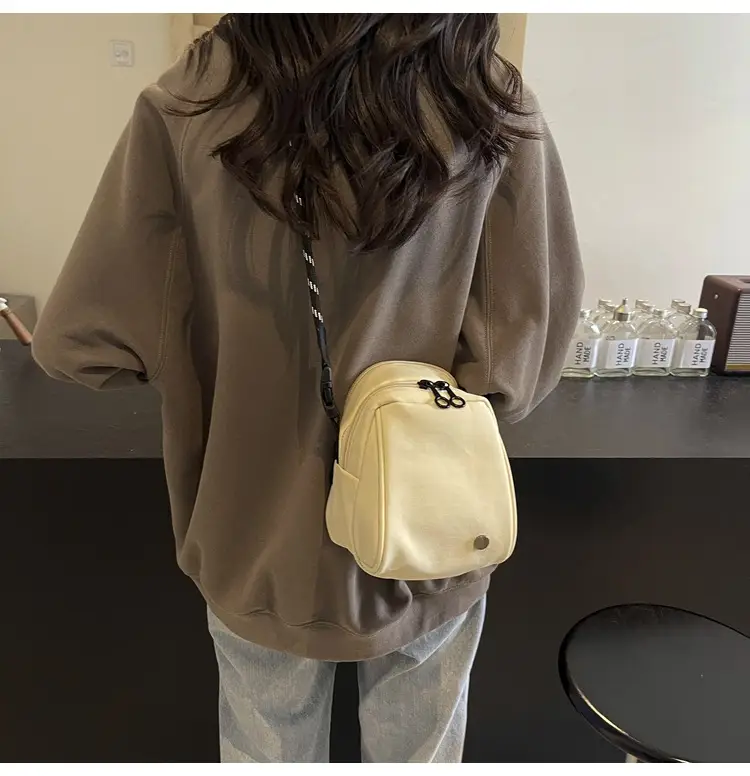 Women's Beige Shell Shoulder Bag with Front Zip & Chain Closure — feature 24