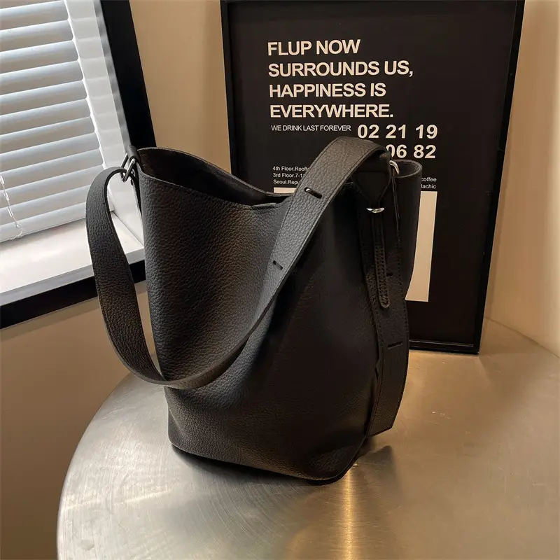 Women's Large Capacity Brown Leather Bucket Bag with Logo