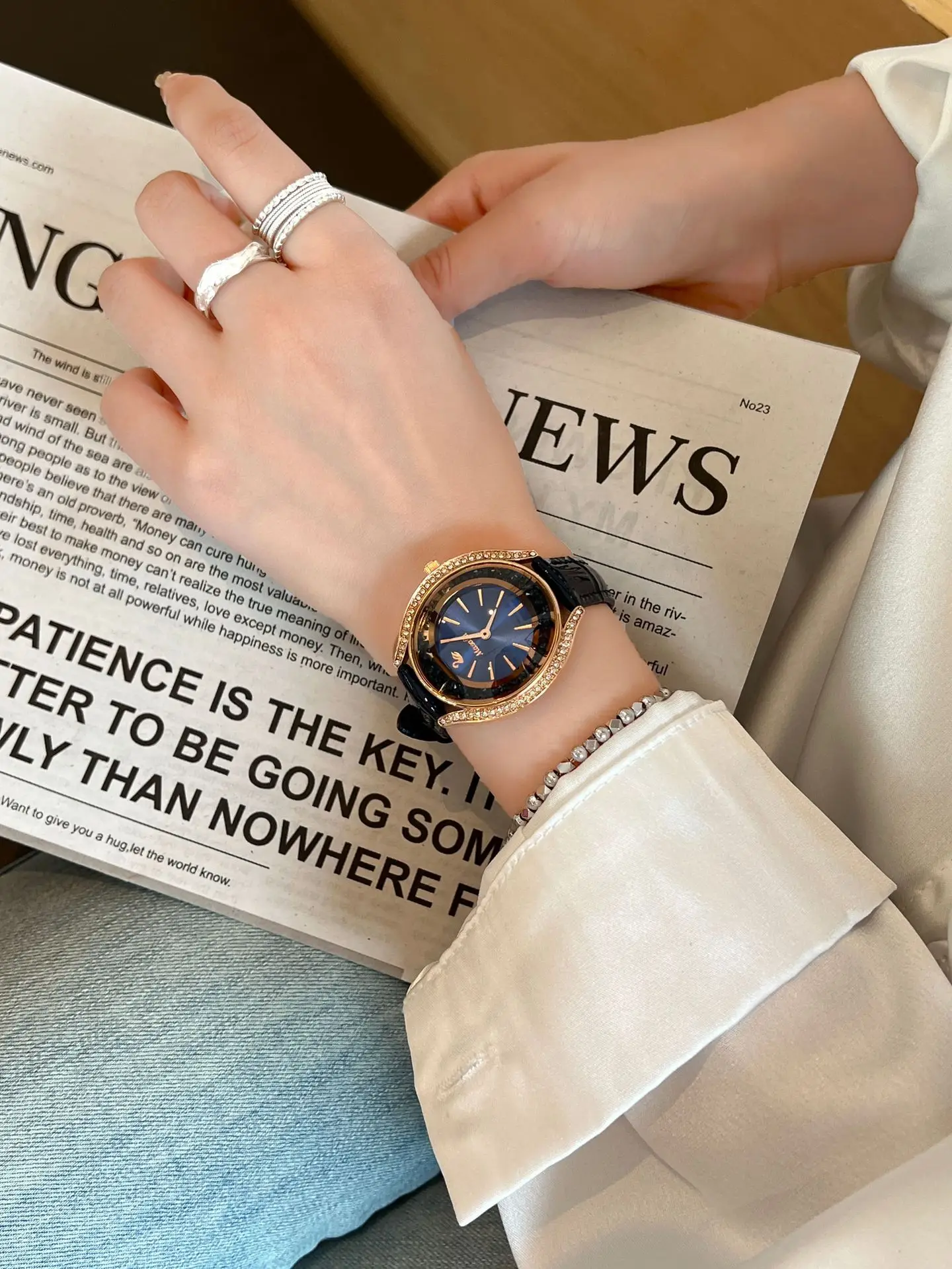Women's Blue Diamond Watch with Gold Case & Sandpaper Strap — feature 6