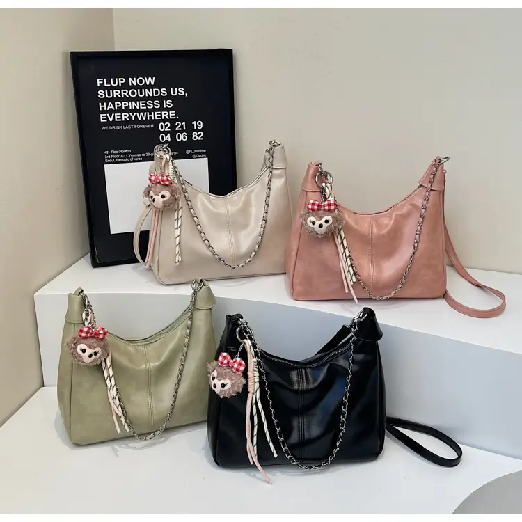 Women's Beige Chain Shoulder Bag with Doll Decor — feature 1