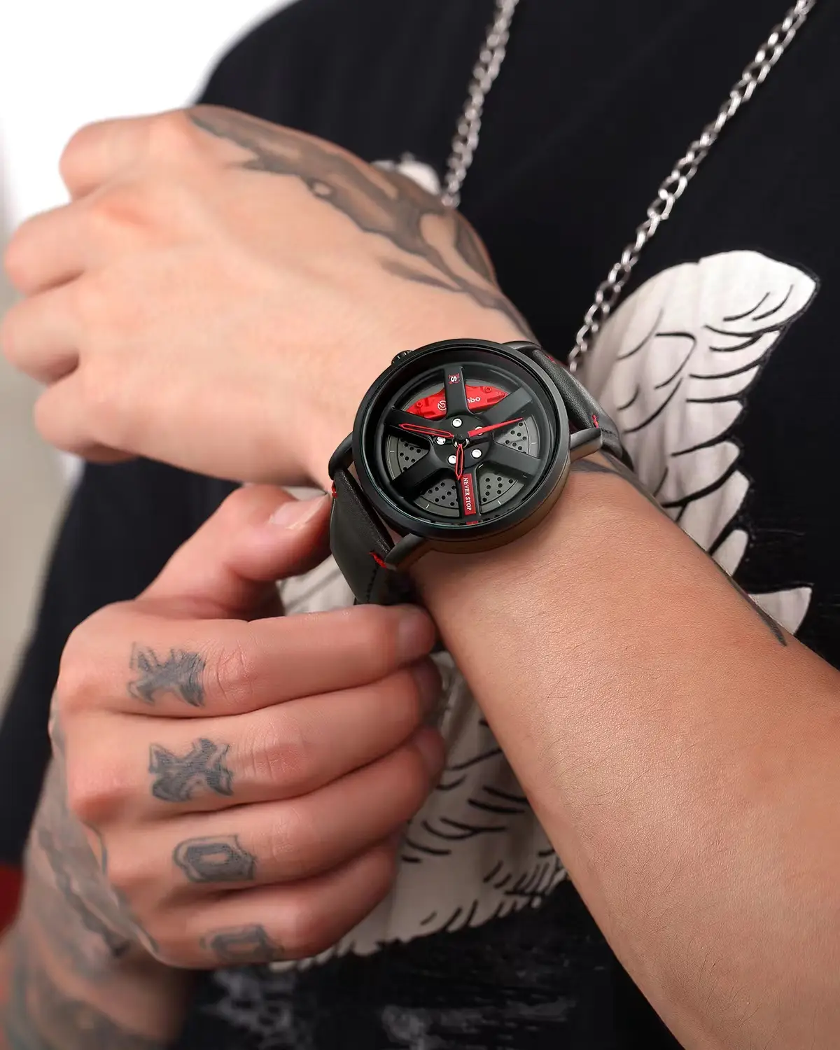 Men's Black Rotating Wheel Quartz Watch with Red Dial — feature 6