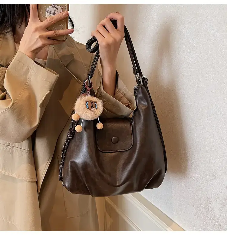 Women's Brown Leather Tote Bag with Pom Pom Charm — feature 16