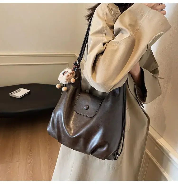 Women's Brown Leather Tote Bag with Pom Pom Charm — feature 17
