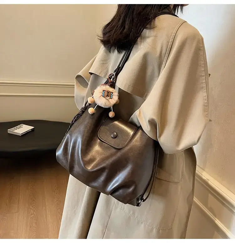 Women's Brown Leather Tote Bag with Pom Pom Charm — feature 19