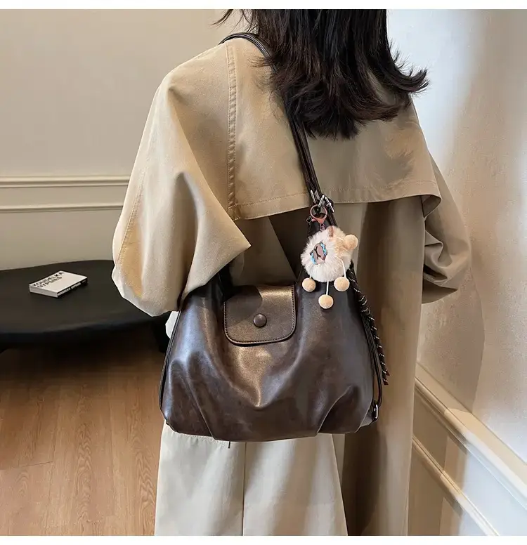 Women's Brown Leather Tote Bag with Pom Pom Charm — feature 21