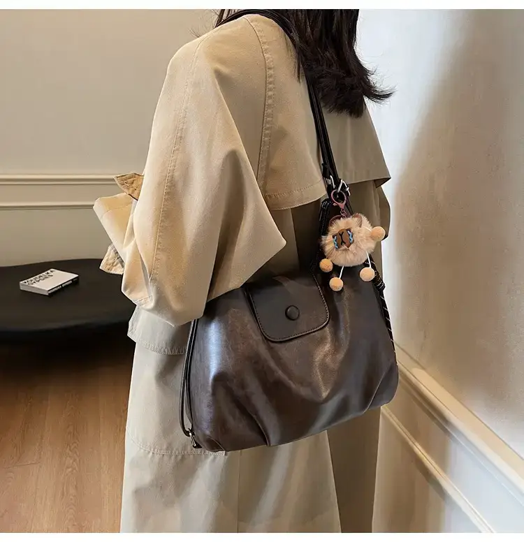 Women's Brown Leather Tote Bag with Pom Pom Charm — feature 22