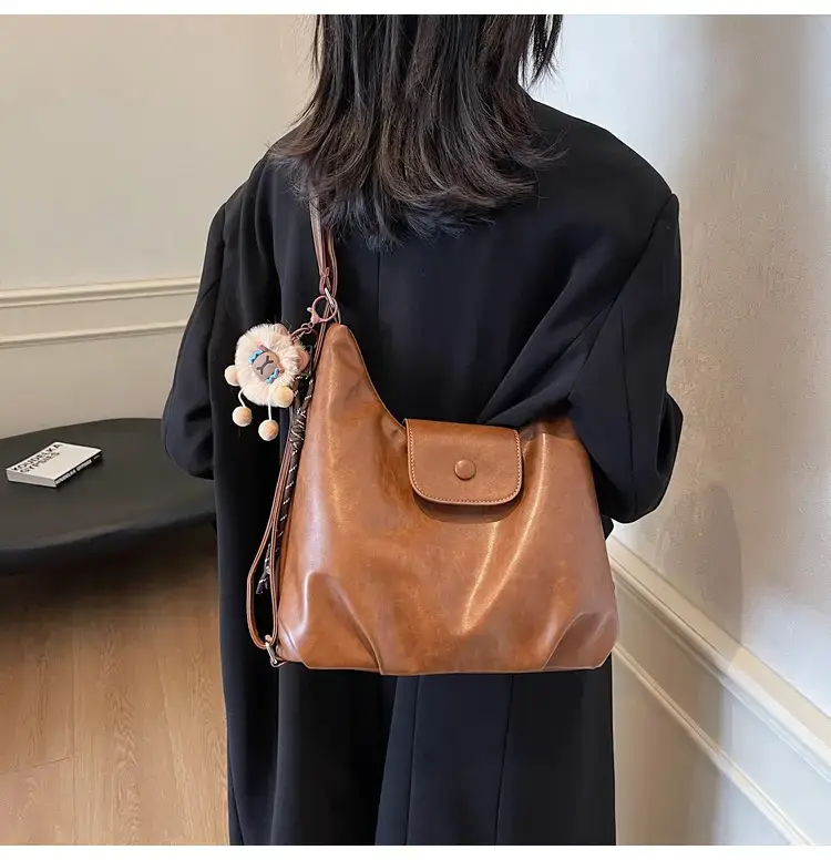 Women's Brown Leather Tote Bag with Pom Pom Charm — feature 24