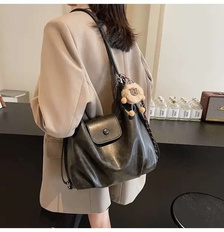 Women's Brown Leather Tote Bag with Pom Pom Charm — feature 35