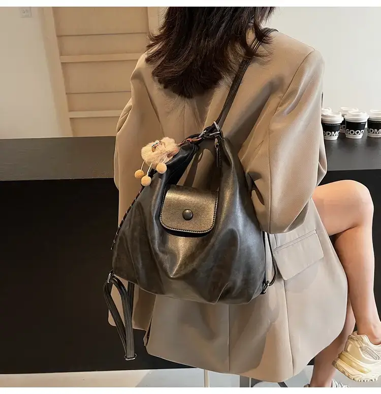 Women's Brown Leather Tote Bag with Pom Pom Charm — feature 37