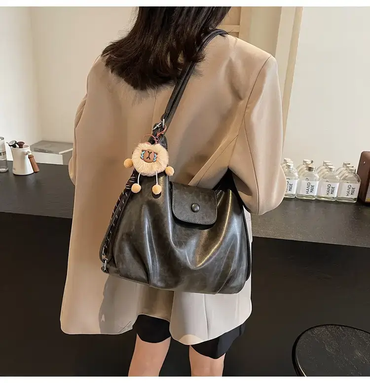 Women's Brown Leather Tote Bag with Pom Pom Charm — feature 41