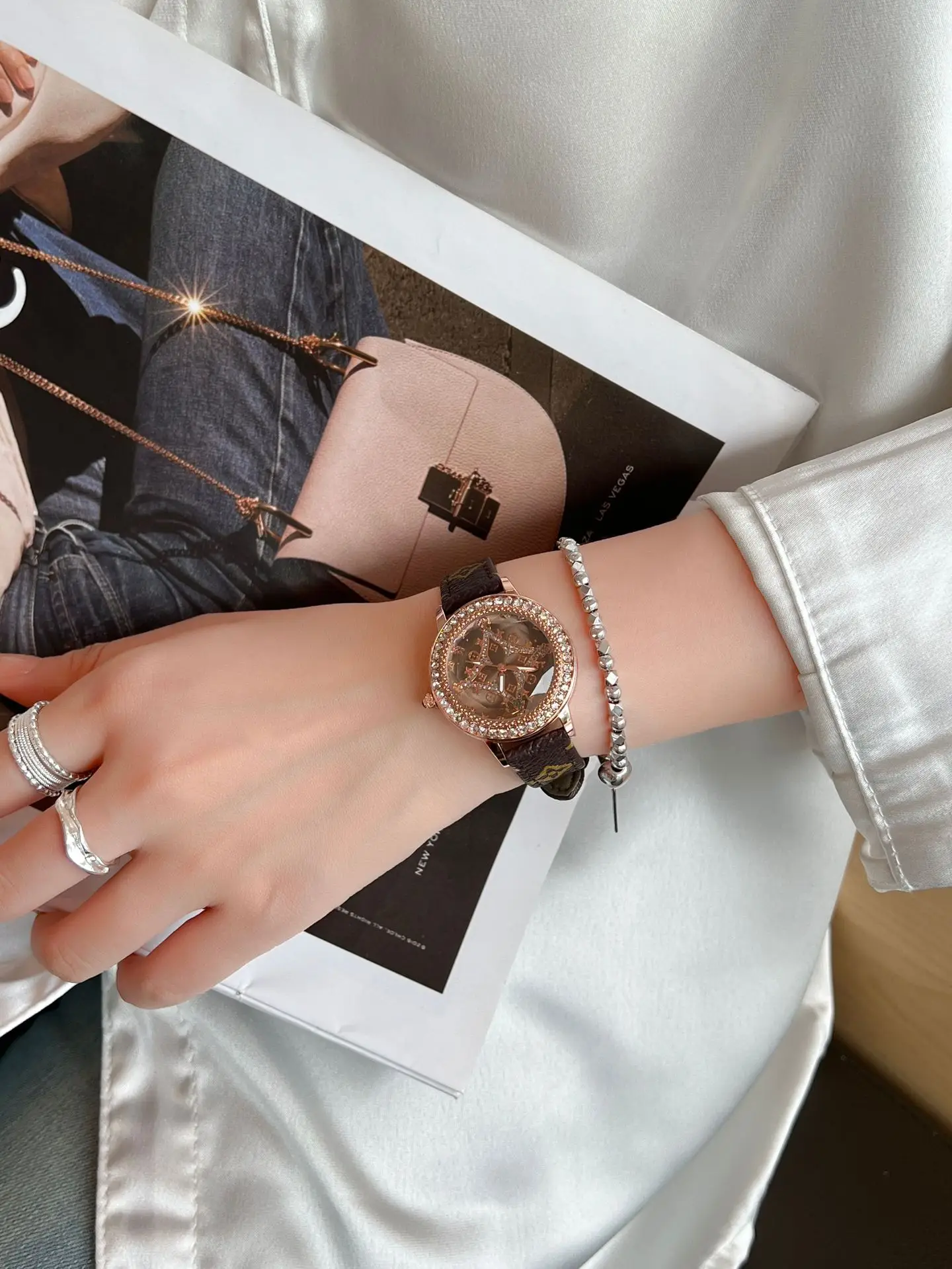 Gold Diamond Encrusted Women's Watch with Leather Band — feature 1