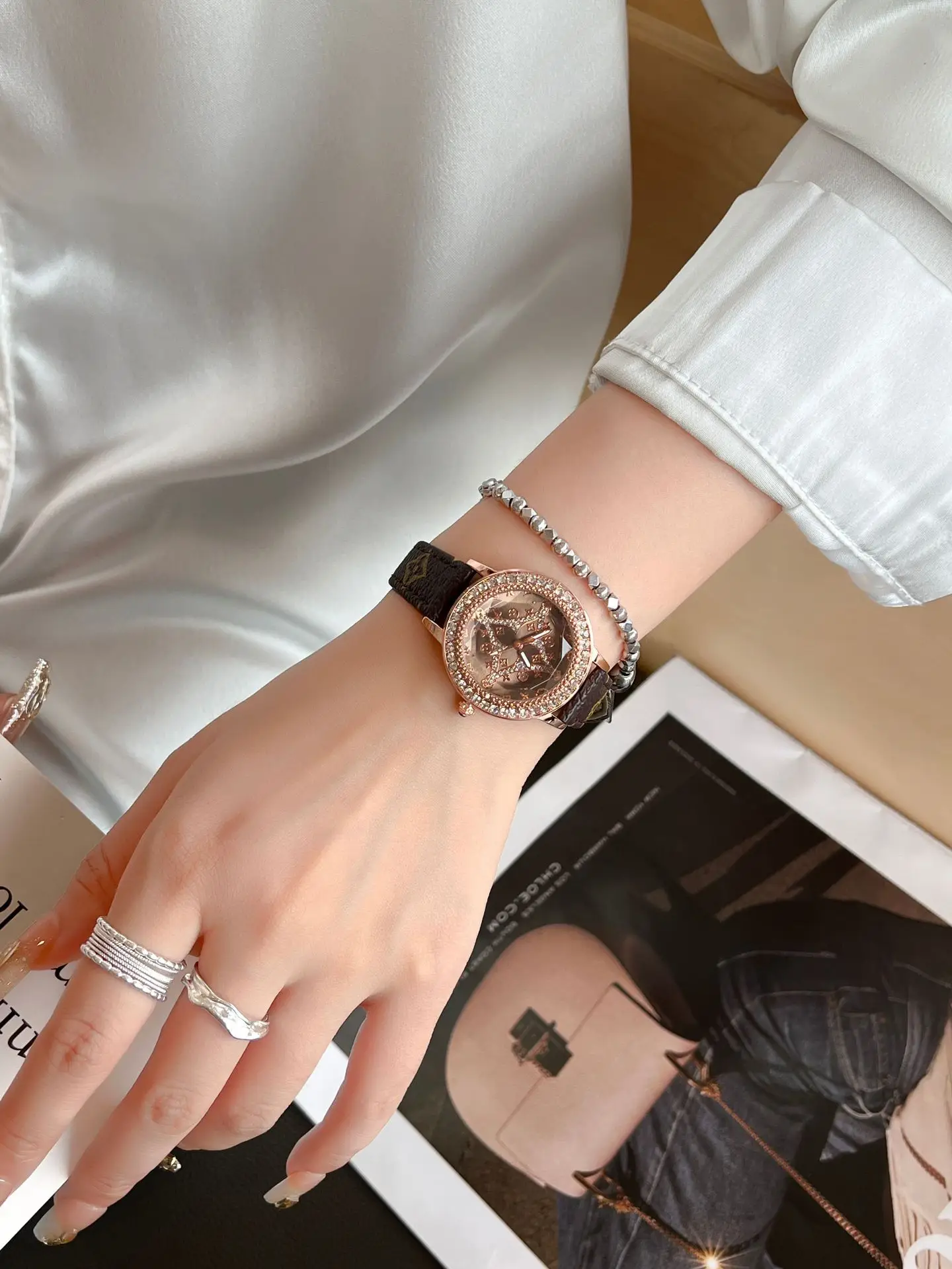 Gold Diamond Encrusted Women's Watch with Leather Band — feature 2