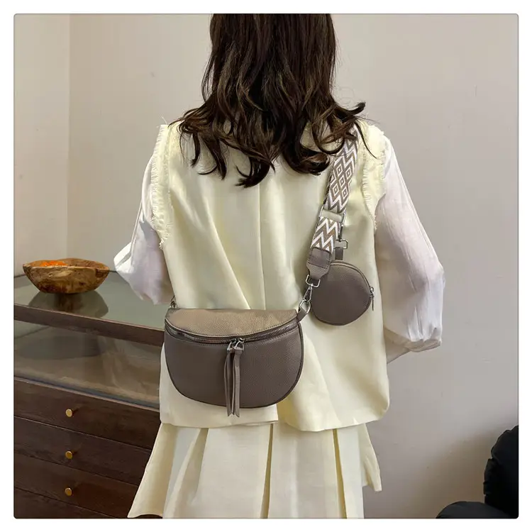 Black Women's Crossbody Bag with Logo & Tassel Design — feature 17