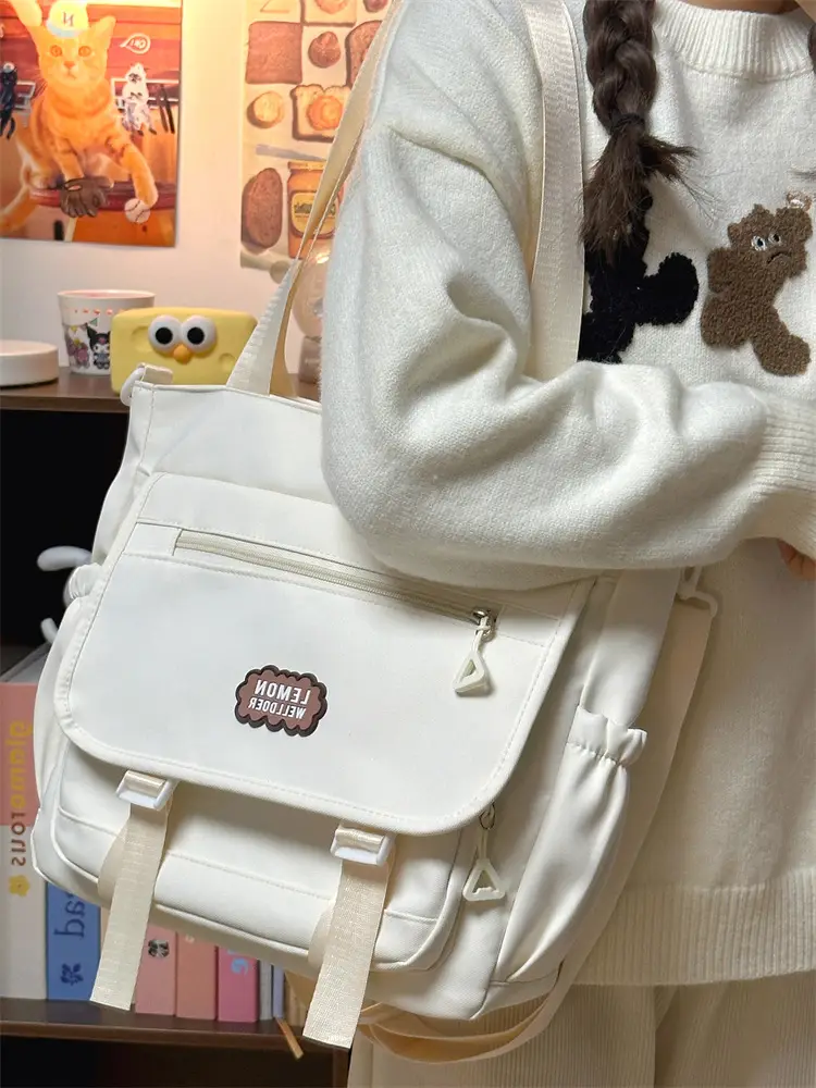Women's Creamy Crossbody Bag with Cloud Embroidery — feature 13