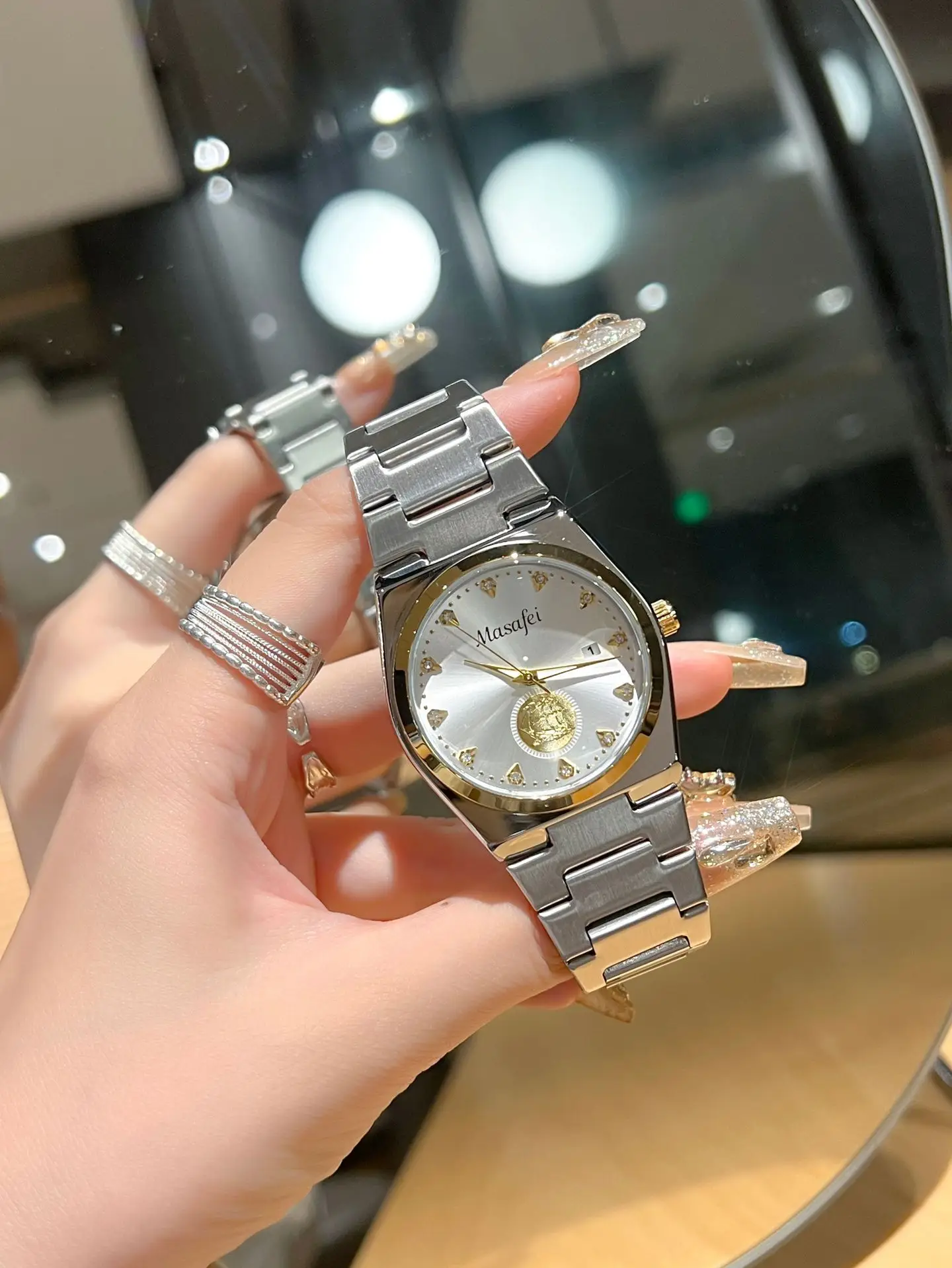 Men's Gold Skeleton Watch with Silver Chain Strap — feature 2
