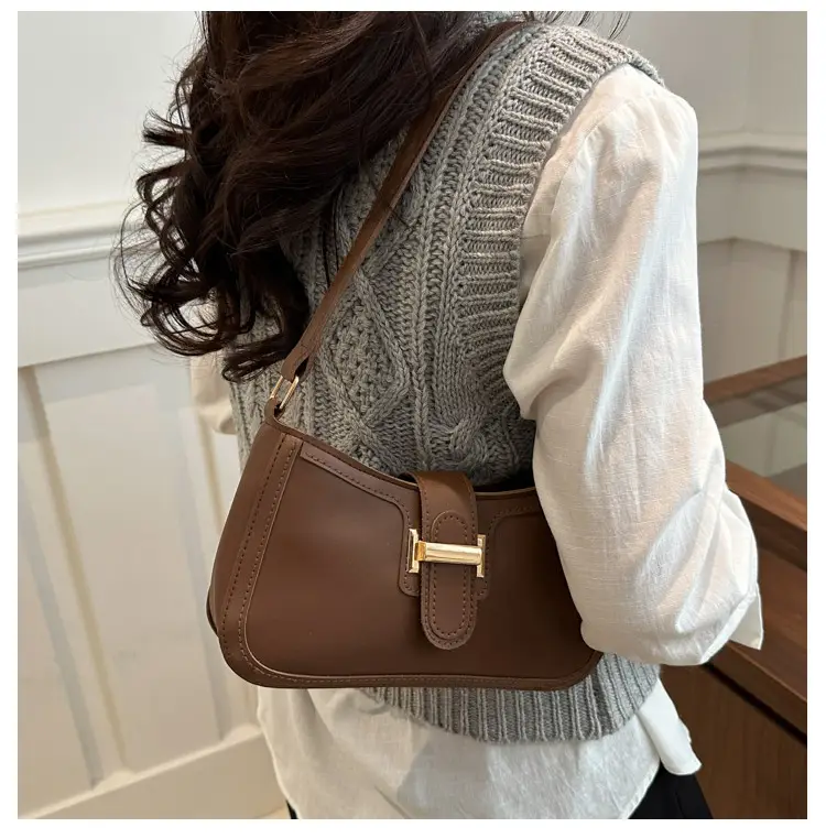 Black Textured Shoulder Bag with Gold Buckle — feature 14