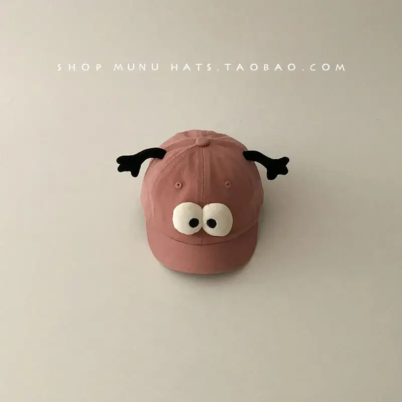 Baby Brown Tentacle Hat with White Eyes — feature 17