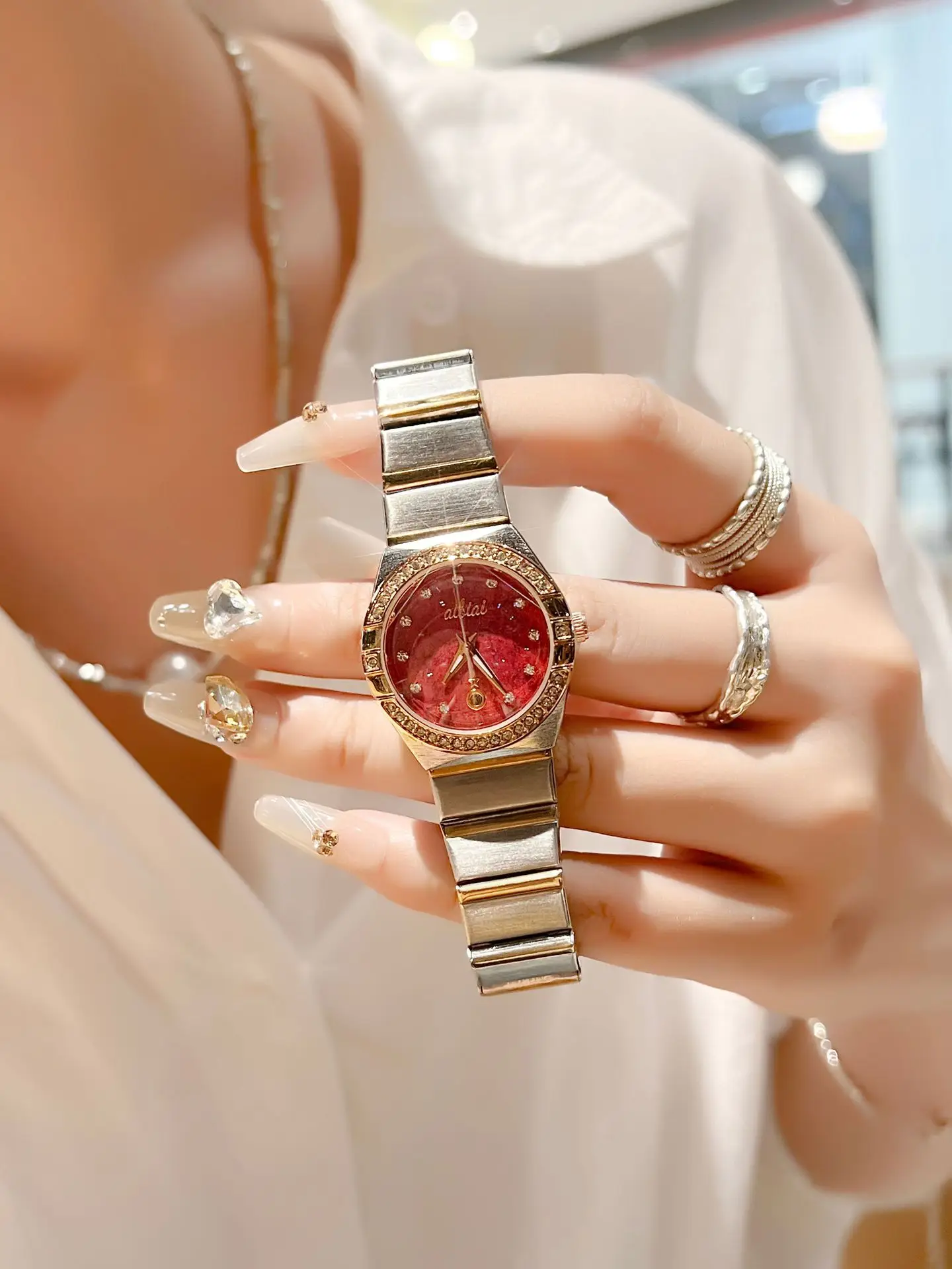 Women's Cross-Brand Diamond Watch with Log Steel Band — feature 1