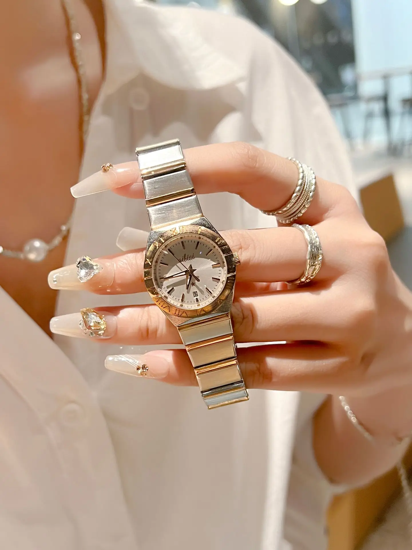 Women's Cross-Brand Diamond Watch with Log Steel Band — feature 3