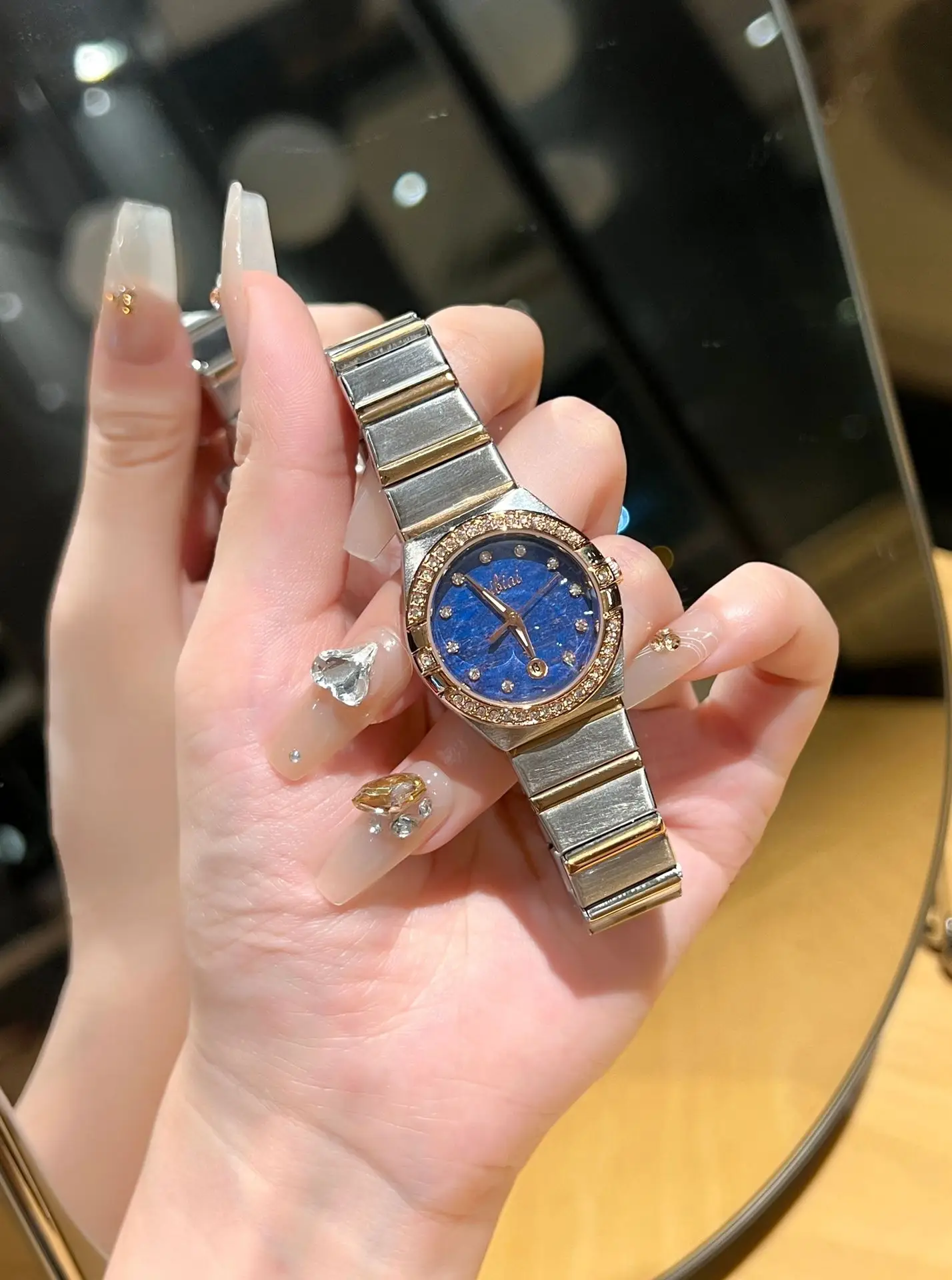 Women's Cross-Brand Diamond Watch with Log Steel Band — feature 5