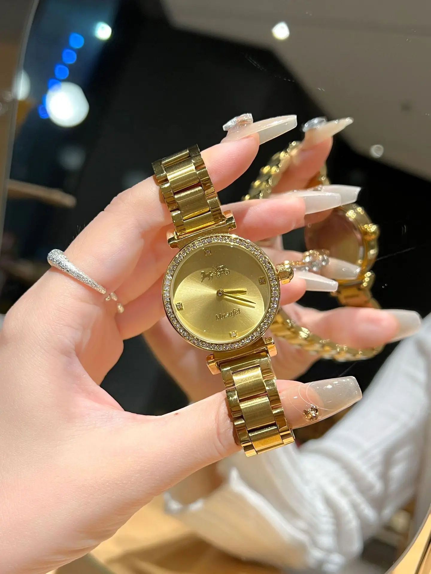 Gold Cross Strap Women's Watch with Crystal Dial — feature 1