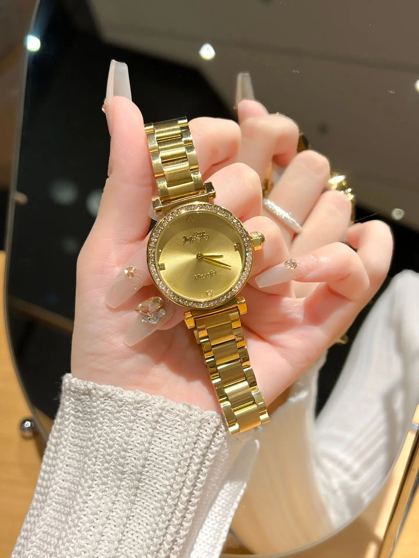 Gold Cross Strap Women's Watch with Crystal Dial — feature 2