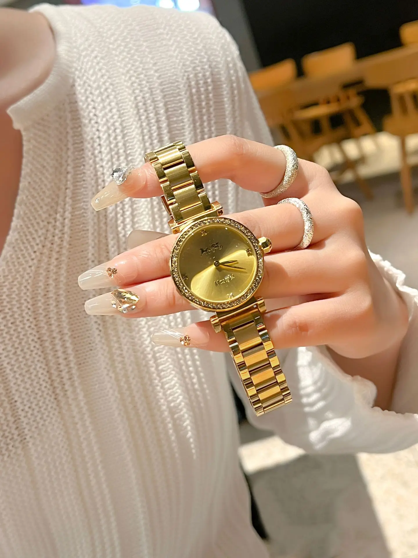 Gold Cross Strap Women's Watch with Crystal Dial — feature 4