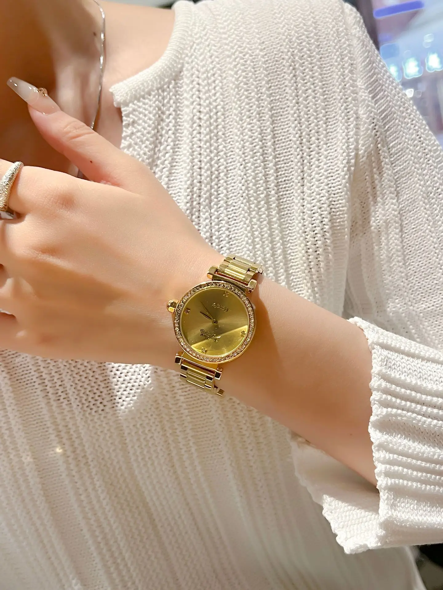Gold Cross Strap Women's Watch with Crystal Dial — feature 5