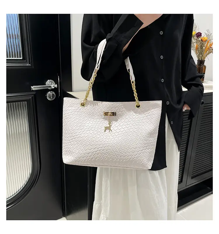 White Women's Shoulder Bag with Gold Chain & Pony Design — feature 21