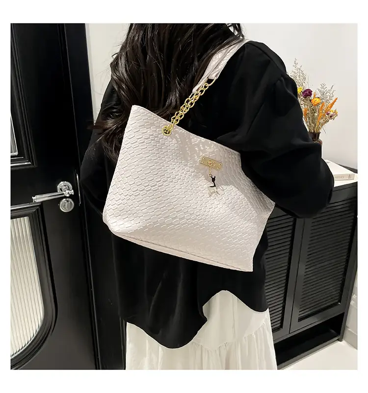 White Women's Shoulder Bag with Gold Chain & Pony Design — feature 22
