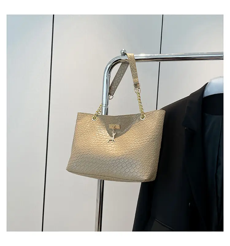 White Women's Shoulder Bag with Gold Chain & Pony Design — feature 28