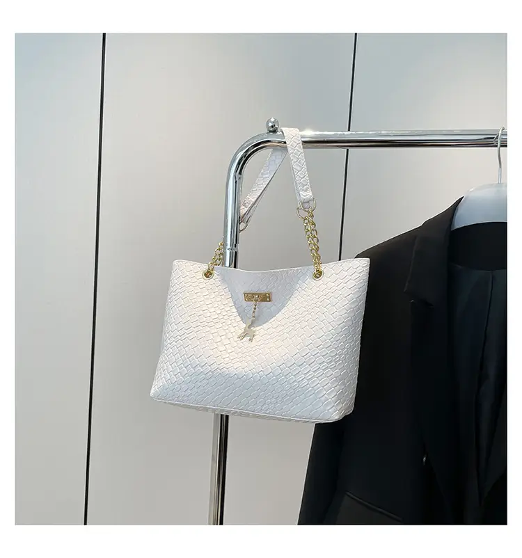 White Women's Shoulder Bag with Gold Chain & Pony Design — feature 29