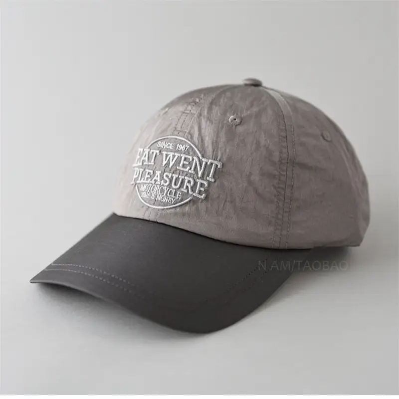 Grey Embroidered Baseball Cap with "New Feather Treasure" Design - Image 9