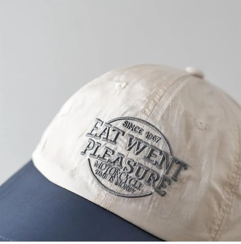 Grey Embroidered Baseball Cap with "New Feather Treasure" Design — feature 10