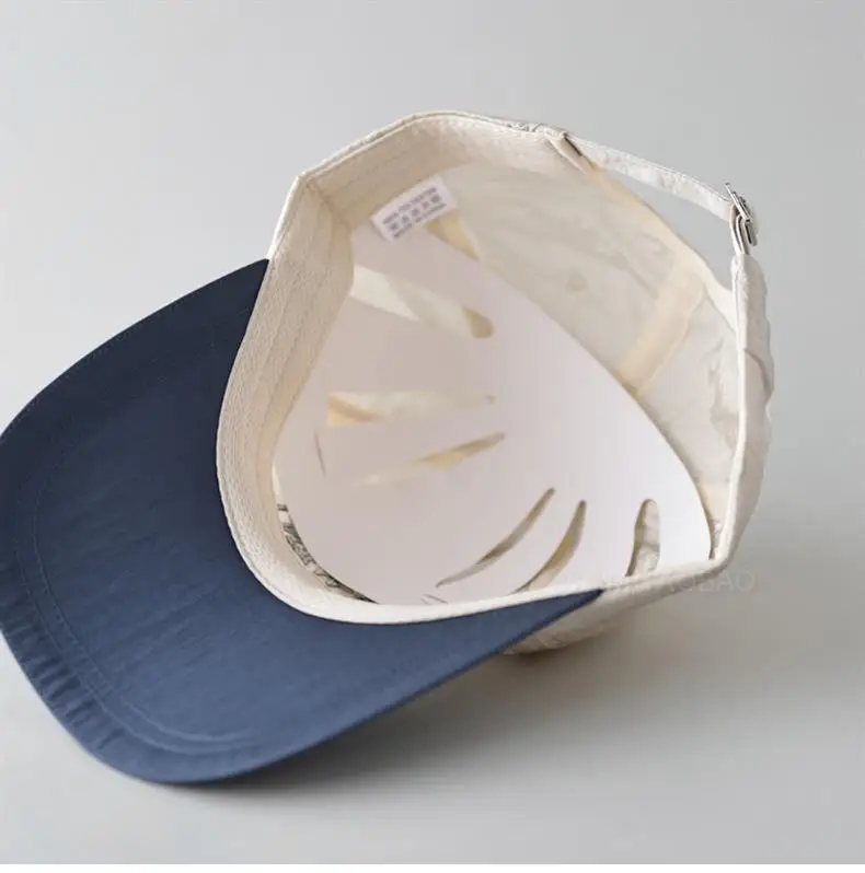 Grey Embroidered Baseball Cap with "New Feather Treasure" Design — feature 11