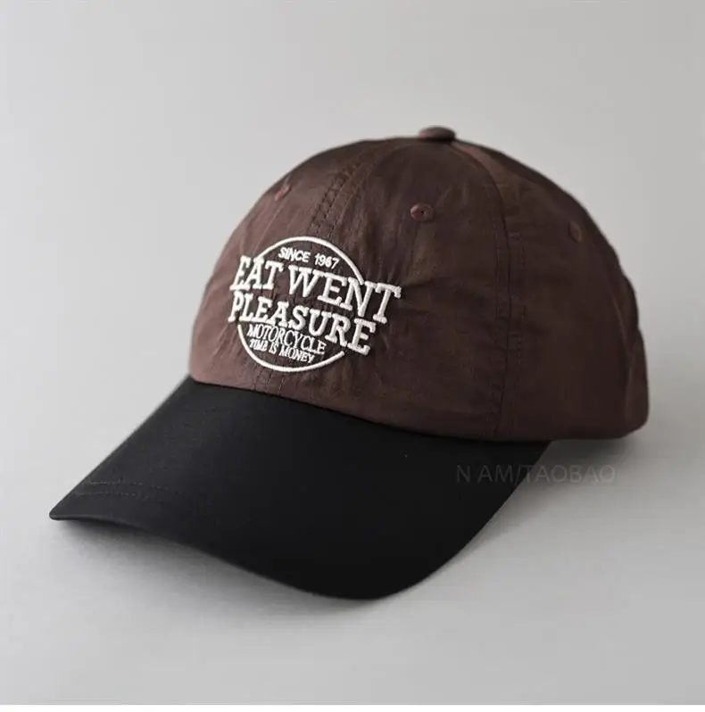 Grey Embroidered Baseball Cap with "New Feather Treasure" Design — feature 5