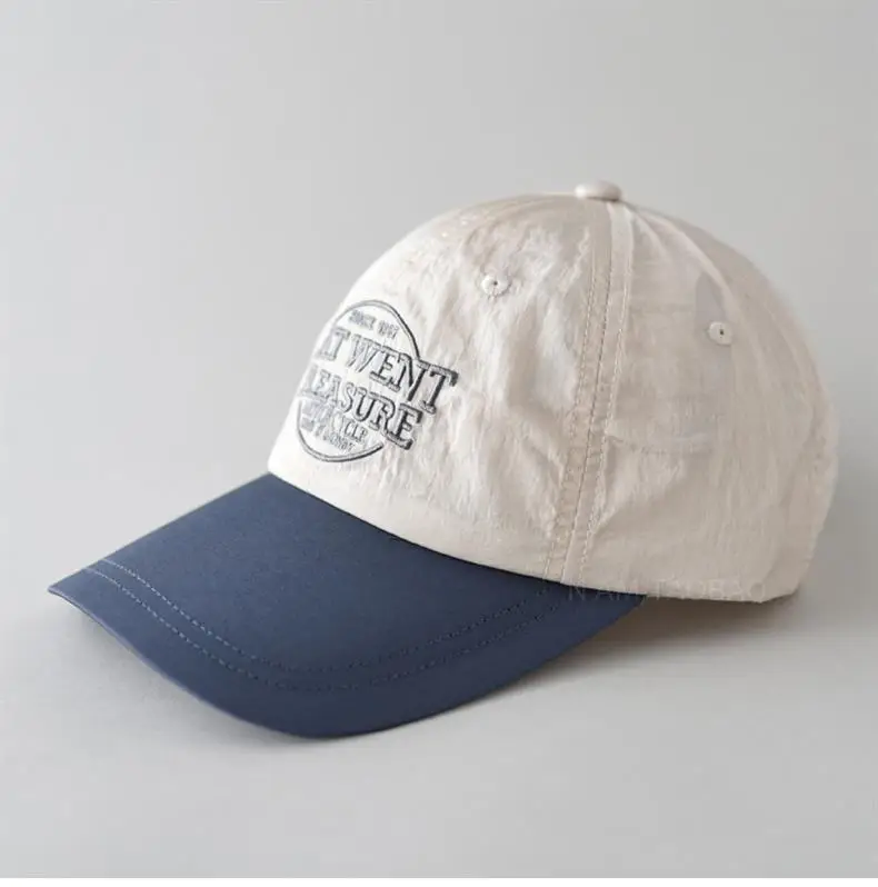 Grey Embroidered Baseball Cap with "New Feather Treasure" Design — feature 9