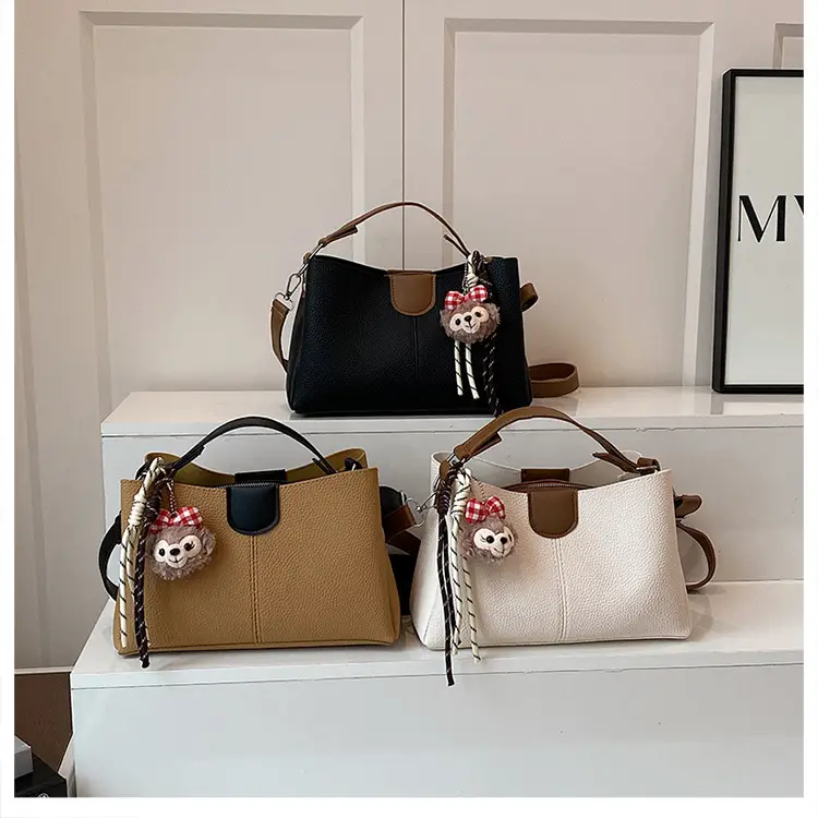 2025 Women's White Leather Shoulder Crossbody Bag with Cute Charm — feature 17